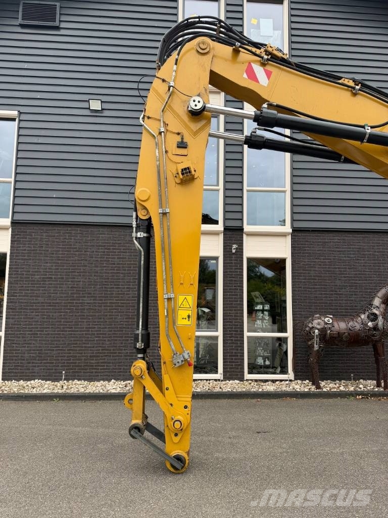 CAT MH 3024 Bagri za prekladanje primarnih/sekundarnih surovin