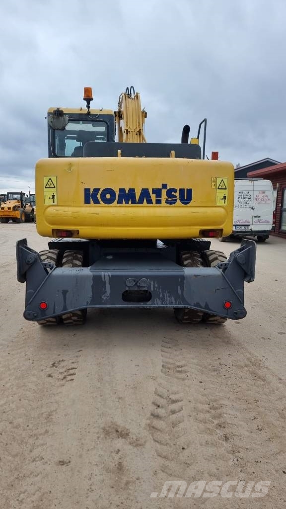 Komatsu PW 130-7K حفارات بعجل