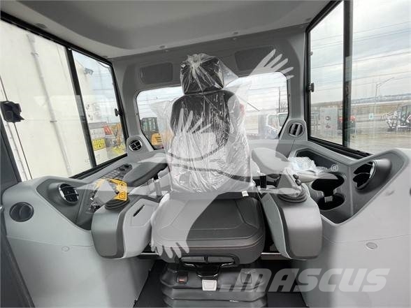 Develon DD100 Pásové dozéry