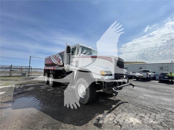 Freightliner FLD120 Vanningsvogn for støvdemping