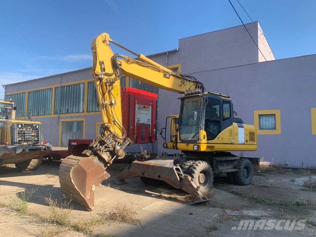 Komatsu PW180-E0+Engcon Rototilt Mobilbagger