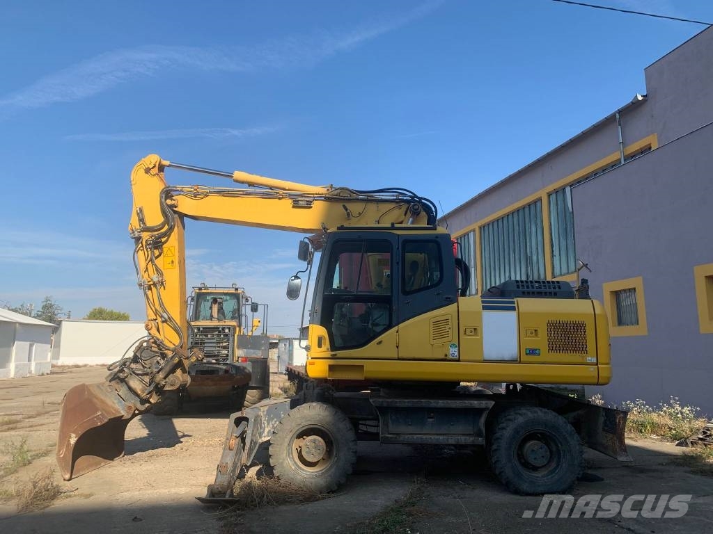 Komatsu PW180-E0+Engcon Rototilt Mobilbagger