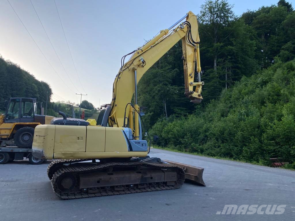 New Holland E 215 B Pásová rýpadla
