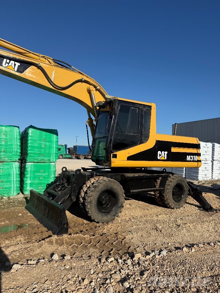 CAT 318M Gravemaskiner på hjul