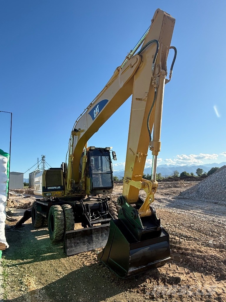 CAT 318M Gravemaskiner på hjul