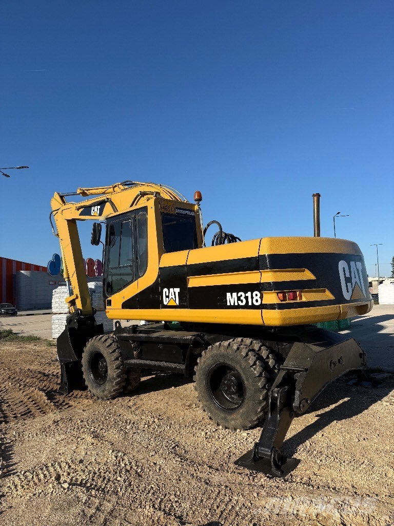 CAT 318M Gravemaskiner på hjul