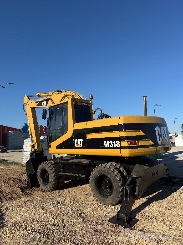 CAT 318M Gravemaskiner på hjul