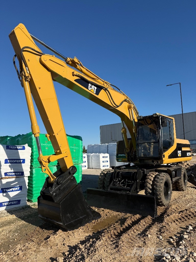 CAT 318M Gravemaskiner på hjul