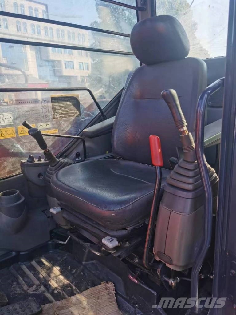 Hitachi ZX 60 Гусеничні екскаватори