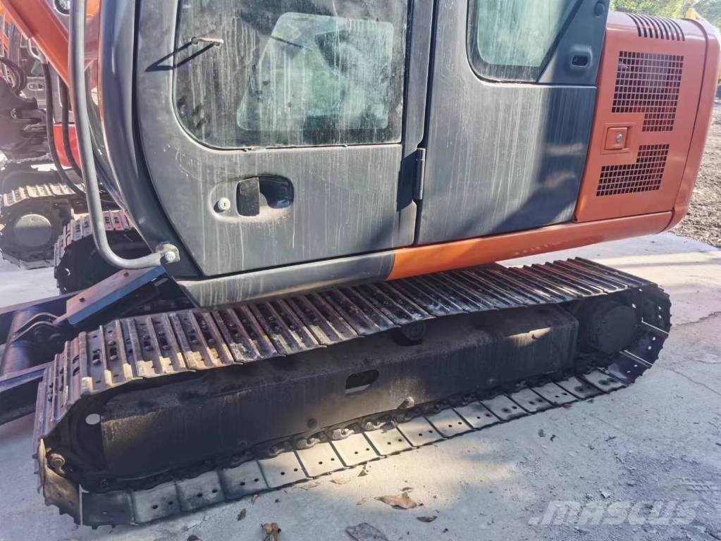 Hitachi ZX 60 Гусеничні екскаватори