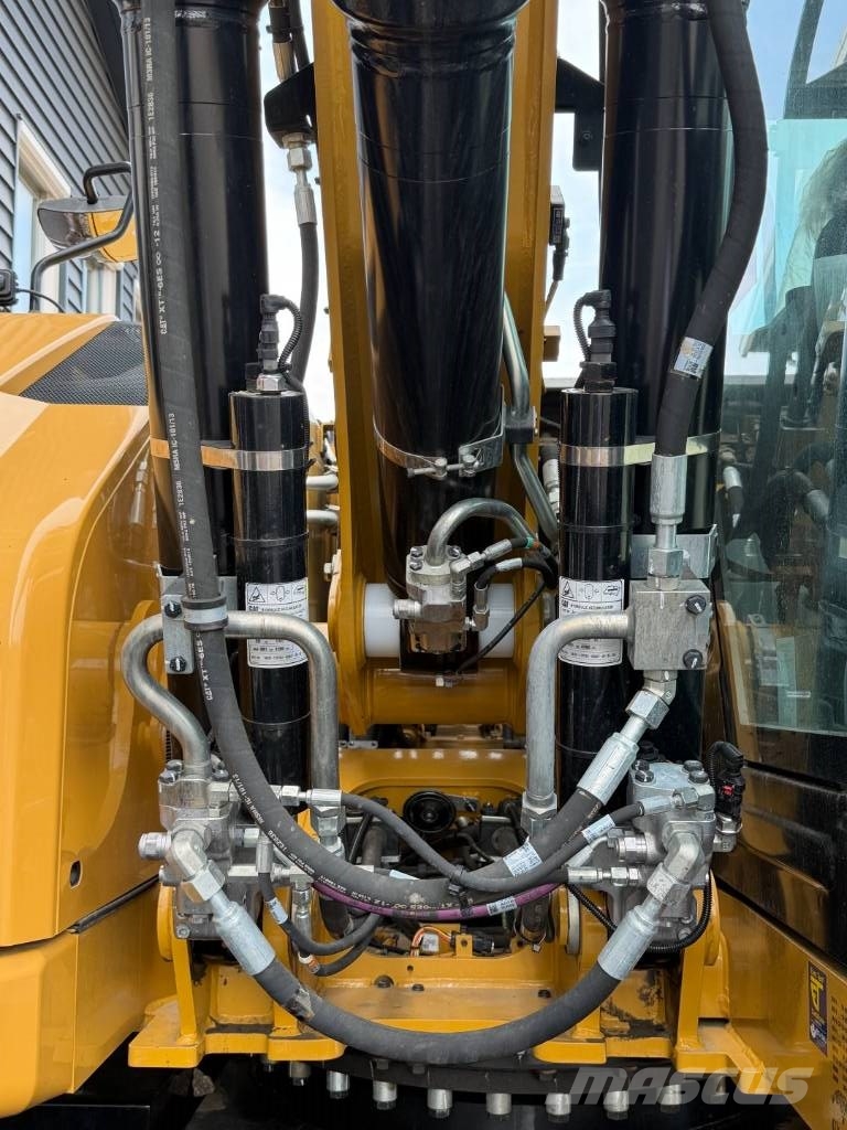 CAT M 318 휠 굴삭기