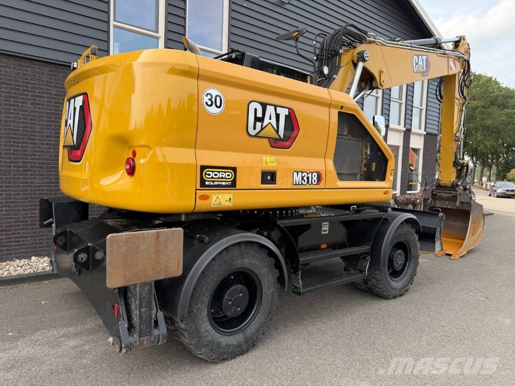 CAT M 318 휠 굴삭기