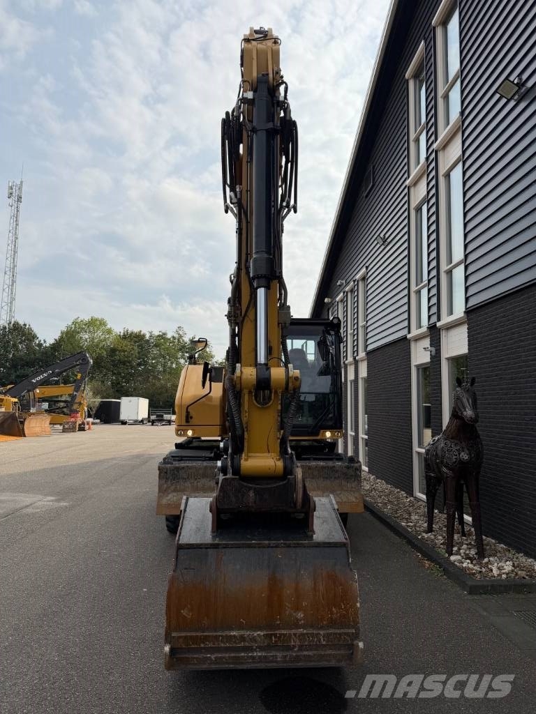 CAT M 318 휠 굴삭기