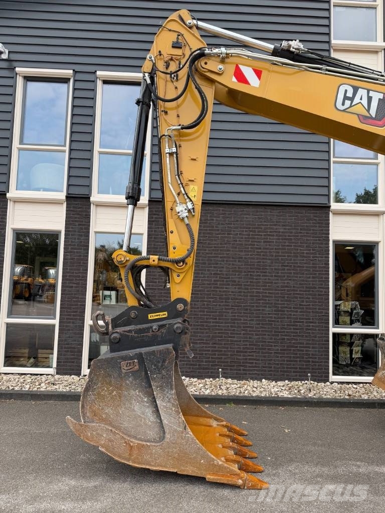 CAT M 318 휠 굴삭기