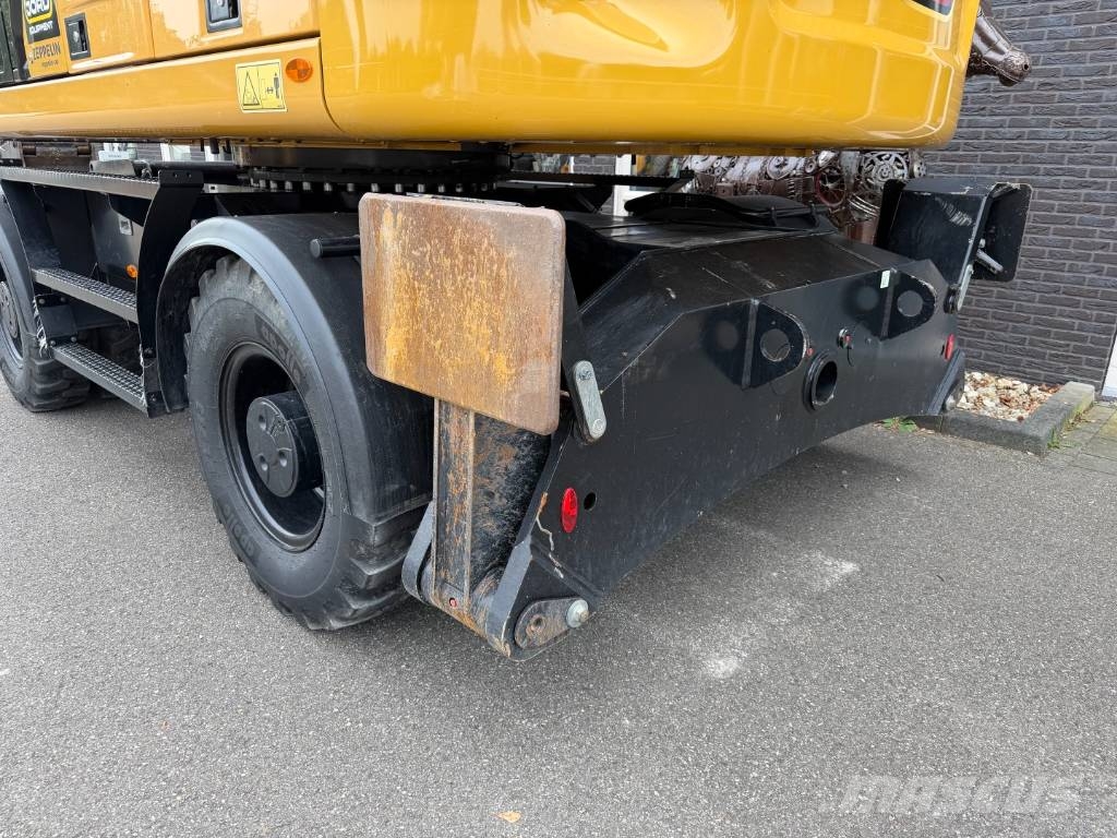 CAT M 318 휠 굴삭기