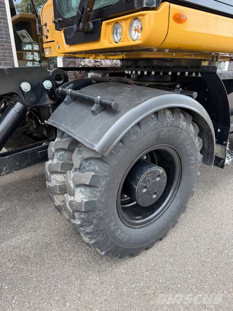 CAT M 318 휠 굴삭기