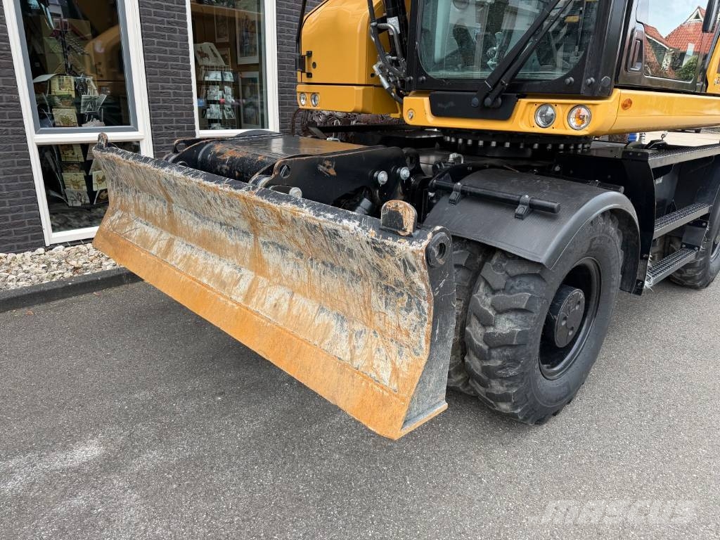 CAT M 318 휠 굴삭기