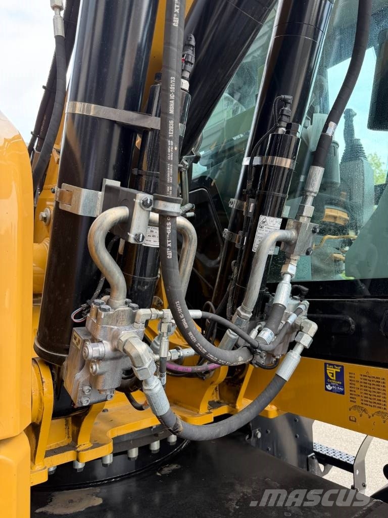 CAT M 318 휠 굴삭기