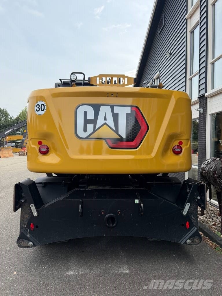 CAT M 318 휠 굴삭기