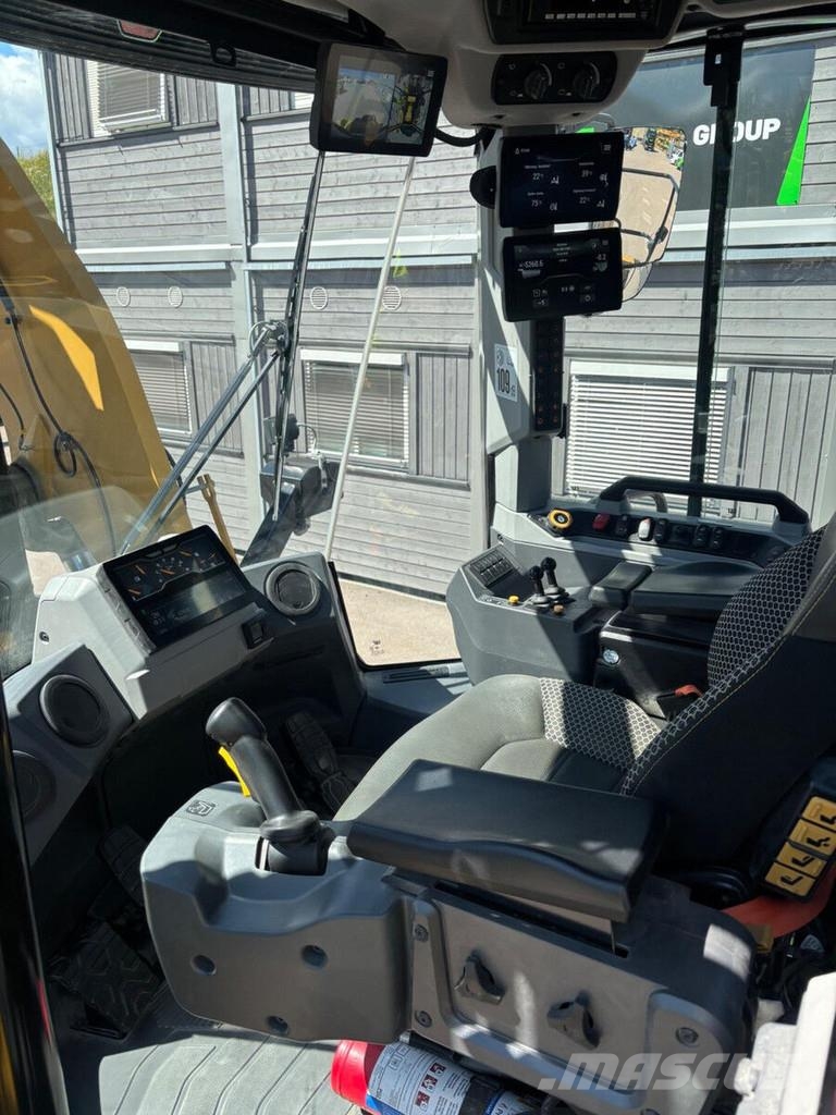 CAT 980 Iekrāvēji uz riteņiem