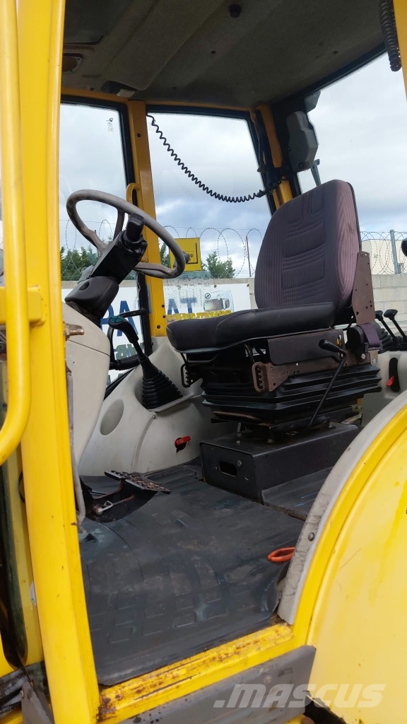 Komatsu WB 97 S-2 لوادر ذات جرافات عكسية