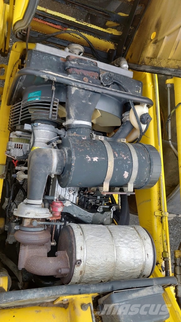 Komatsu WB 97 S-2 لوادر ذات جرافات عكسية