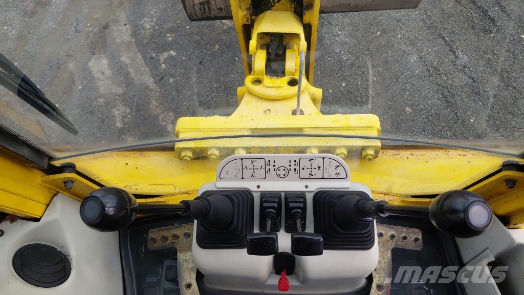 Komatsu WB 97 S-2 لوادر ذات جرافات عكسية