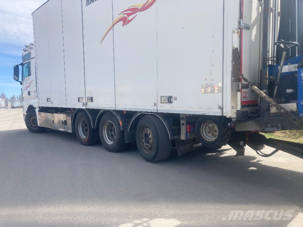 MAN TGX35,580 8X4-4 BL Autocamioane