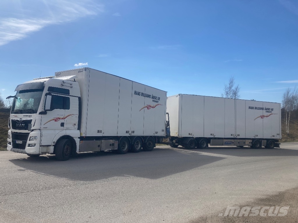 MAN TGX35,580 8X4-4 BL Autocamioane