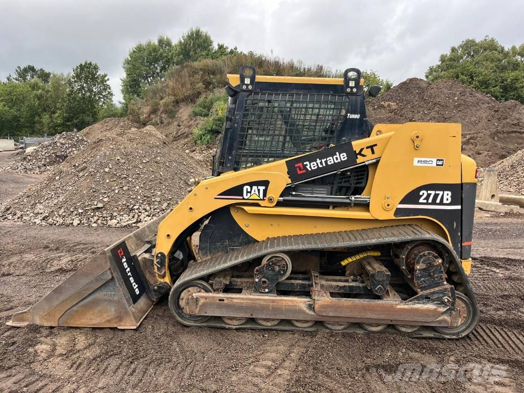 CAT 277 B skopa gafflar jordfräs stensamlare Skid steer mini nakladalci