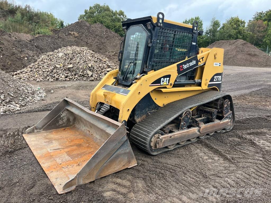 CAT 277 B skopa gafflar jordfräs stensamlare Skid steer mini nakladalci