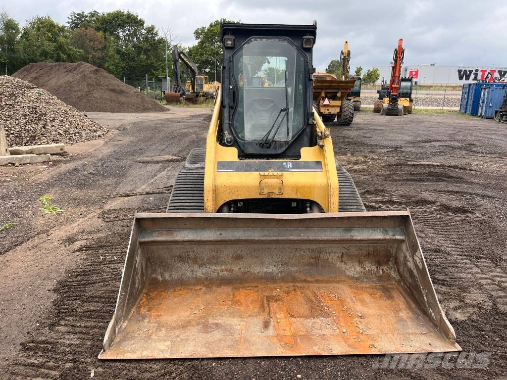 CAT 277 B skopa gafflar jordfräs stensamlare Skid steer mini nakladalci