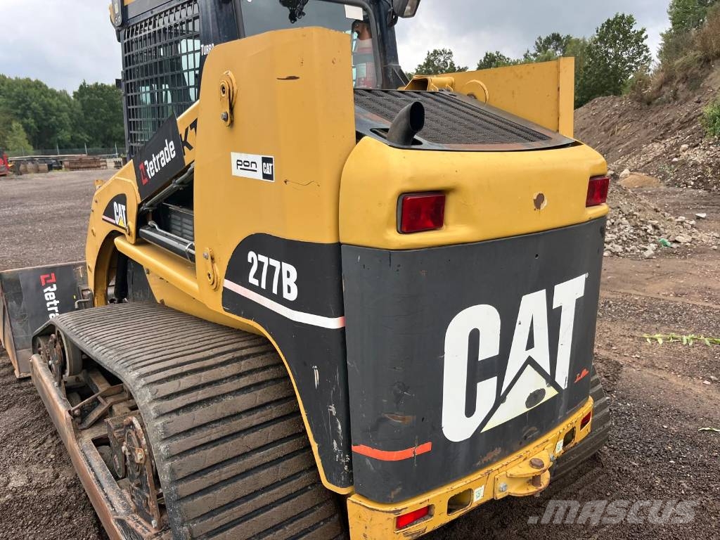 CAT 277 B skopa gafflar jordfräs stensamlare Skid steer mini nakladalci