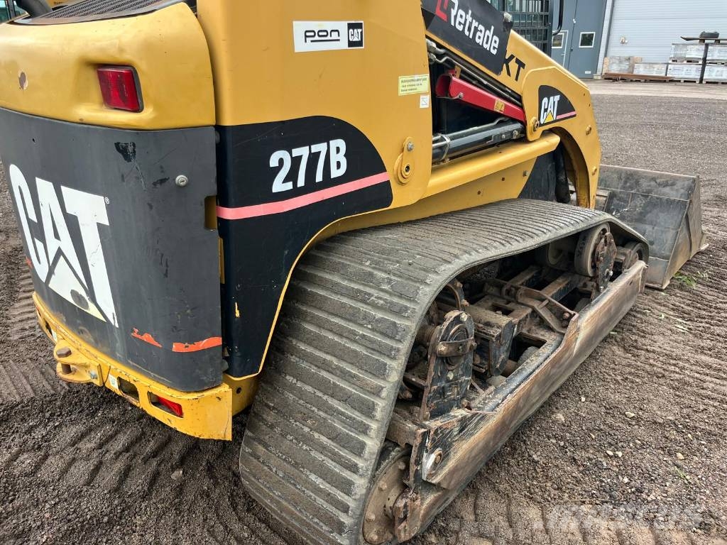 CAT 277 B skopa gafflar jordfräs stensamlare Skid steer mini nakladalci