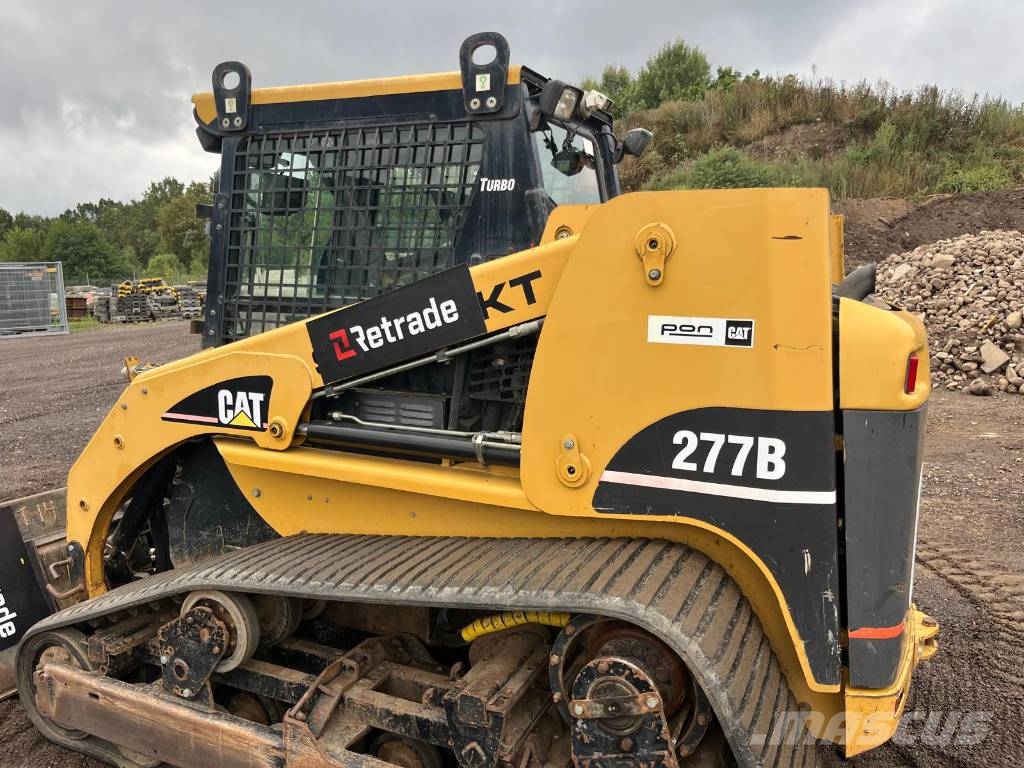 CAT 277 B skopa gafflar jordfräs stensamlare Skid steer mini nakladalci