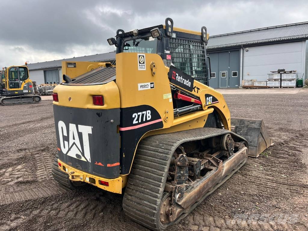 CAT 277 B skopa gafflar jordfräs stensamlare Skid steer mini nakladalci