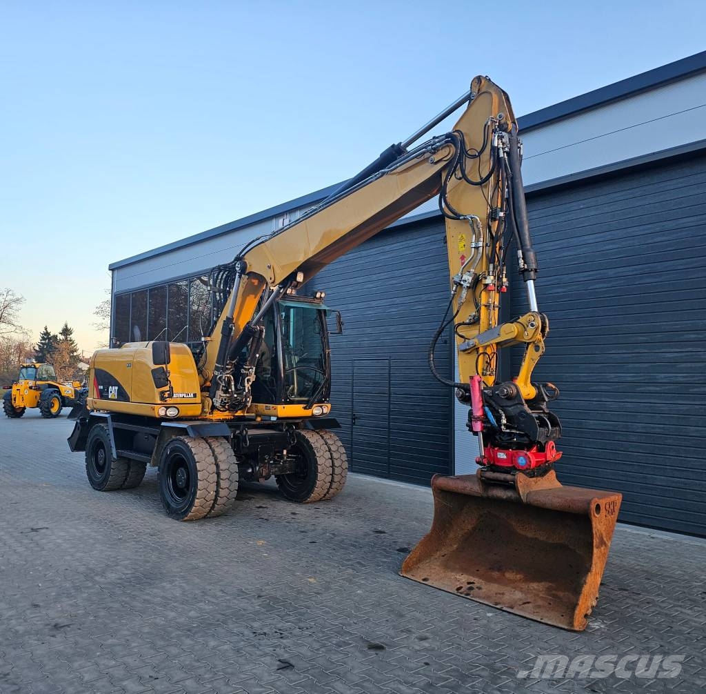 CAT M 313 D Mobilbagger