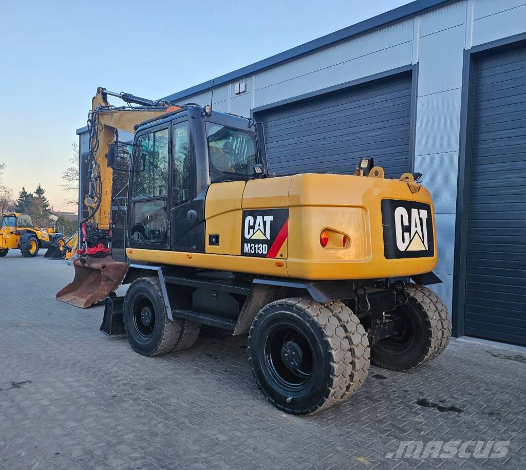 CAT M 313 D Mobilbagger