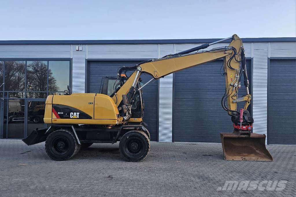 CAT M 313 D Mobilbagger