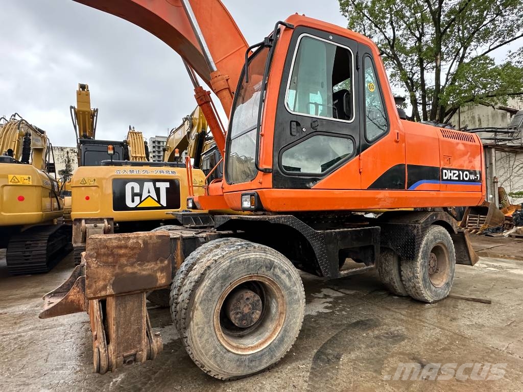 Doosan DH 210 W-7 Rare in‑stock Pelle sur pneus