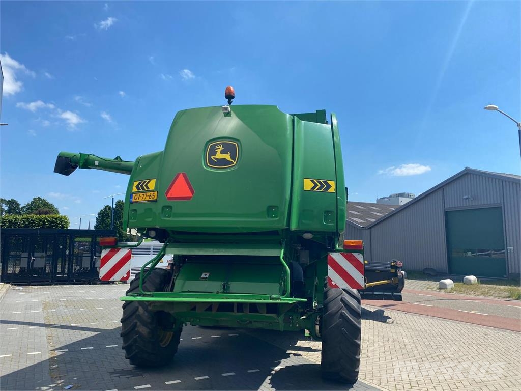 John Deere 9880 STS combine آلات تمزيق الحزم وتقطيعها ونشرها
