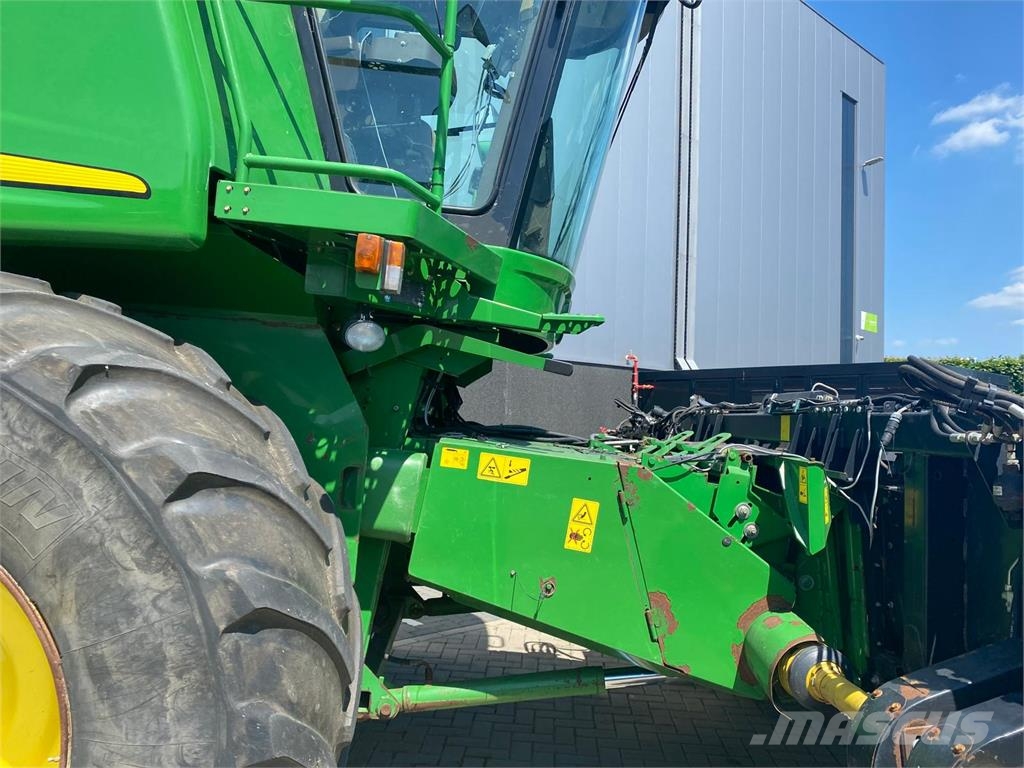 John Deere 9880 STS combine آلات تمزيق الحزم وتقطيعها ونشرها