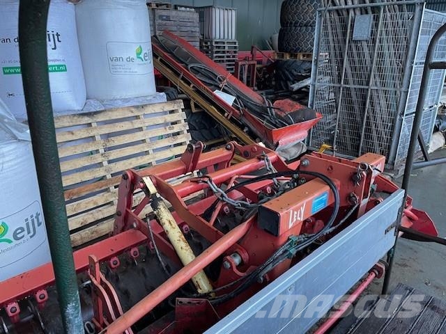 Lely rottera 35-302 en packkerrol en hydraulische hef Gradas rotativas / rotocultivadores