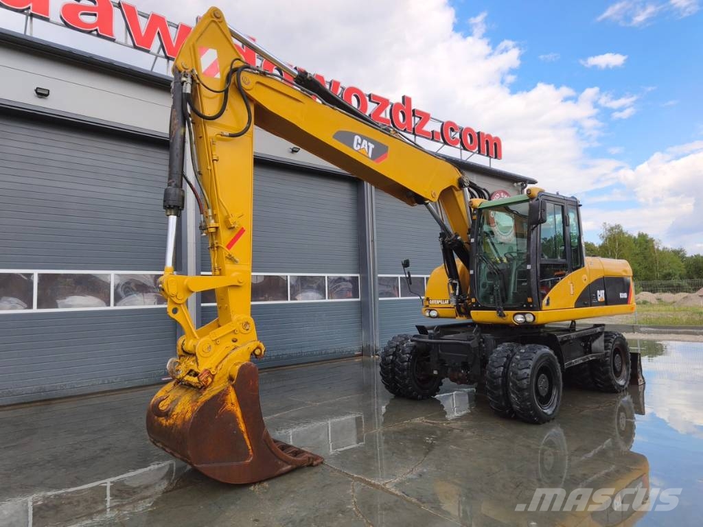 CAT M 318 D Wielgraafmachines