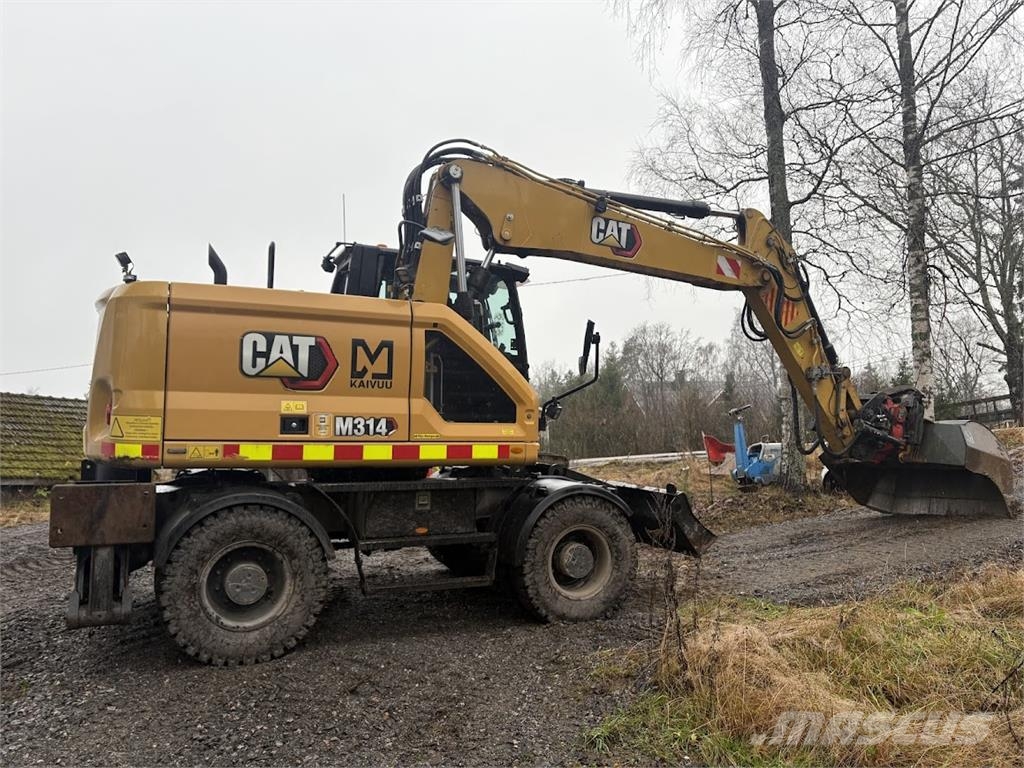 CAT M314 Bagri na kolesih