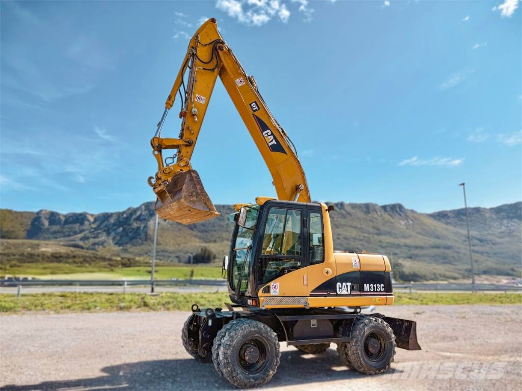 CAT M 313 C Escavadoras de rodas