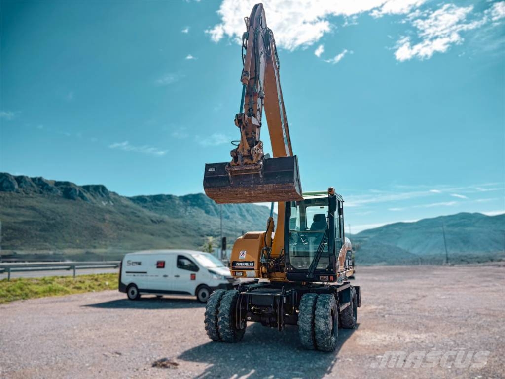 CAT M 313 C Escavadoras de rodas