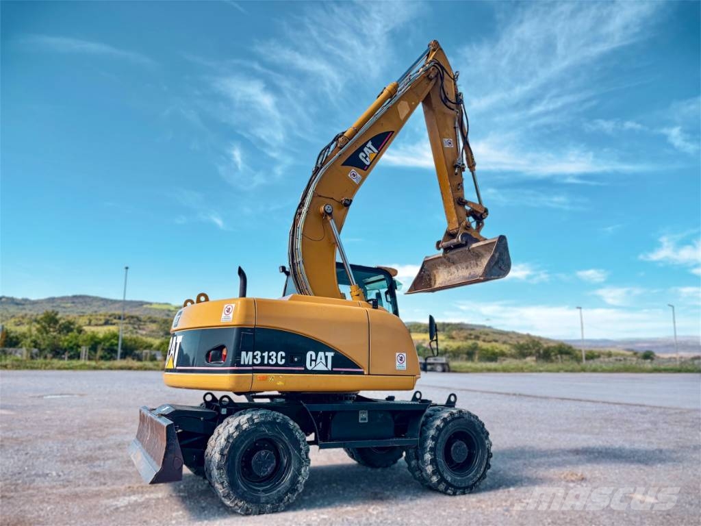 CAT M 313 C Escavadoras de rodas