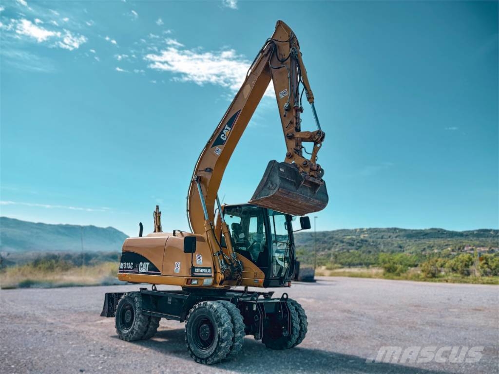 CAT M 313 C Escavadoras de rodas