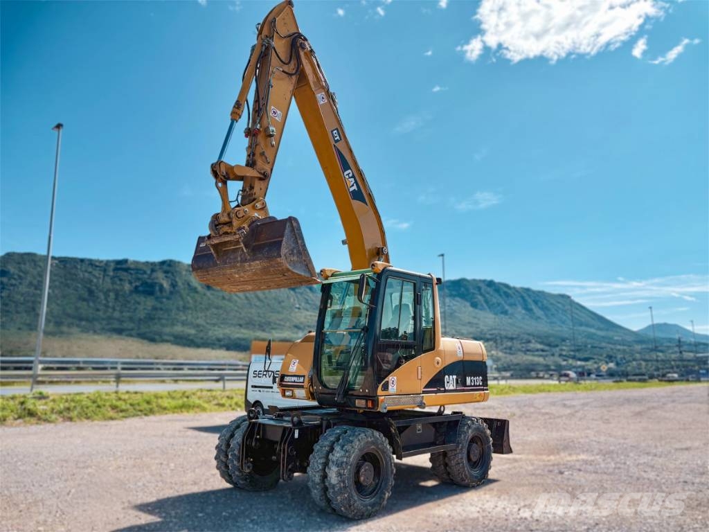 CAT M 313 C Escavadoras de rodas